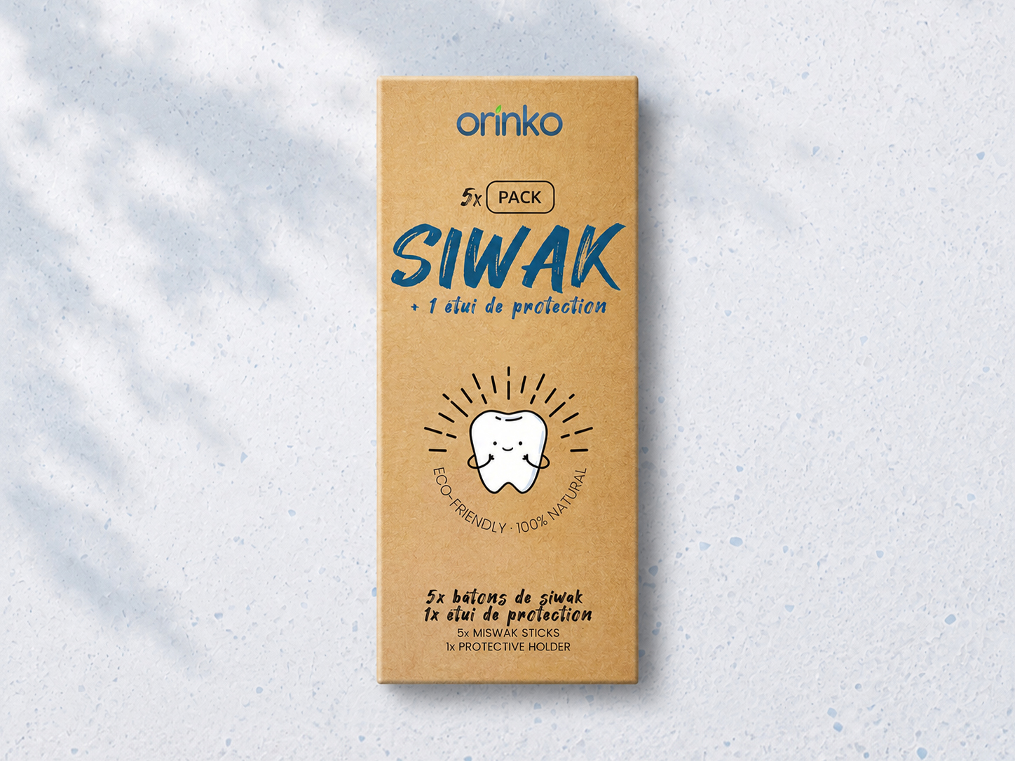 Une boîte de siwak prête pour le rayon contenant plusieurs bâtons scellés sous vide